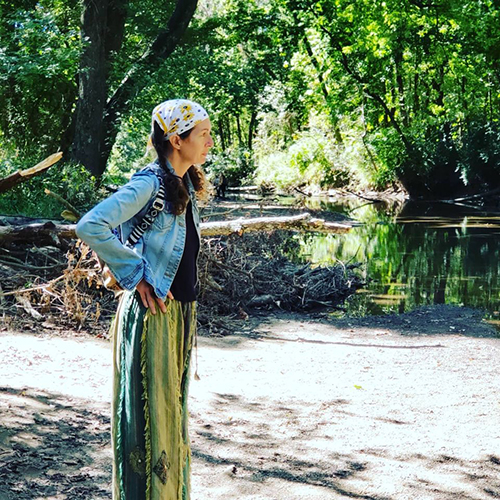 Alicia Anino standing in nature