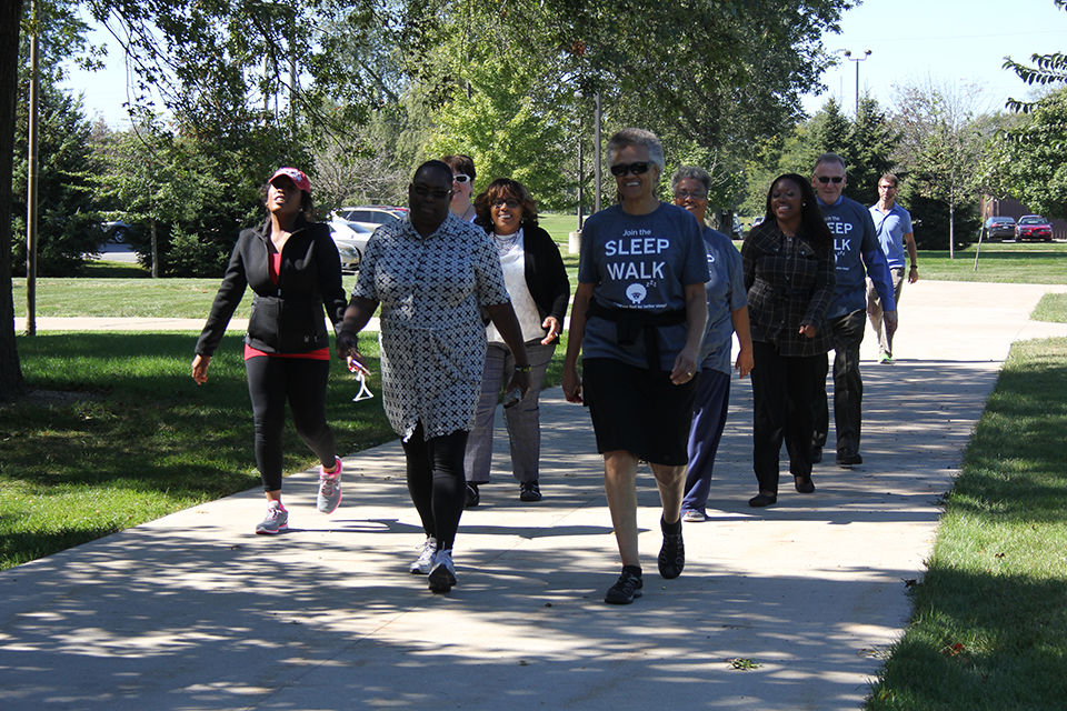 IU employees walking outside