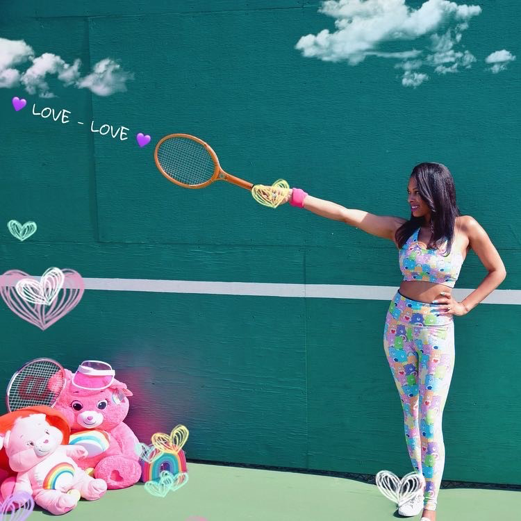 Rachel on a tennis court with Care-Bears
