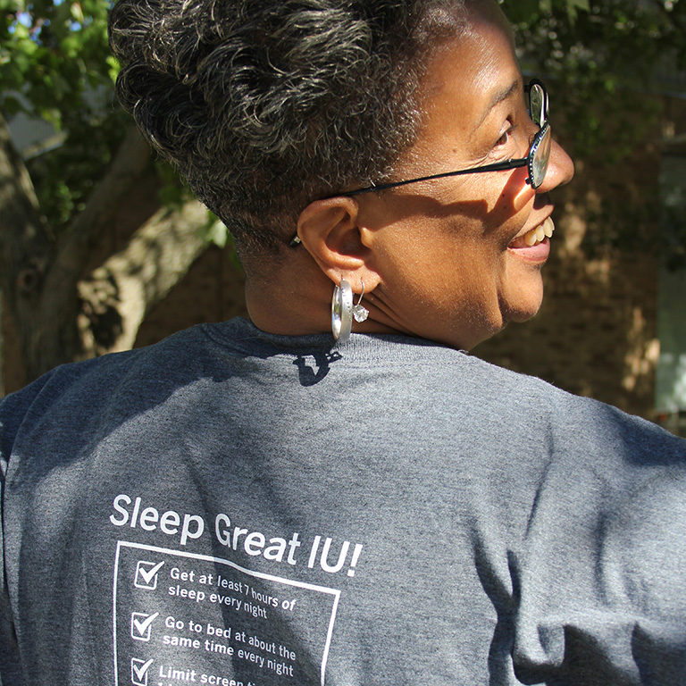 Lena showing off a Sleep Great IU! shirt