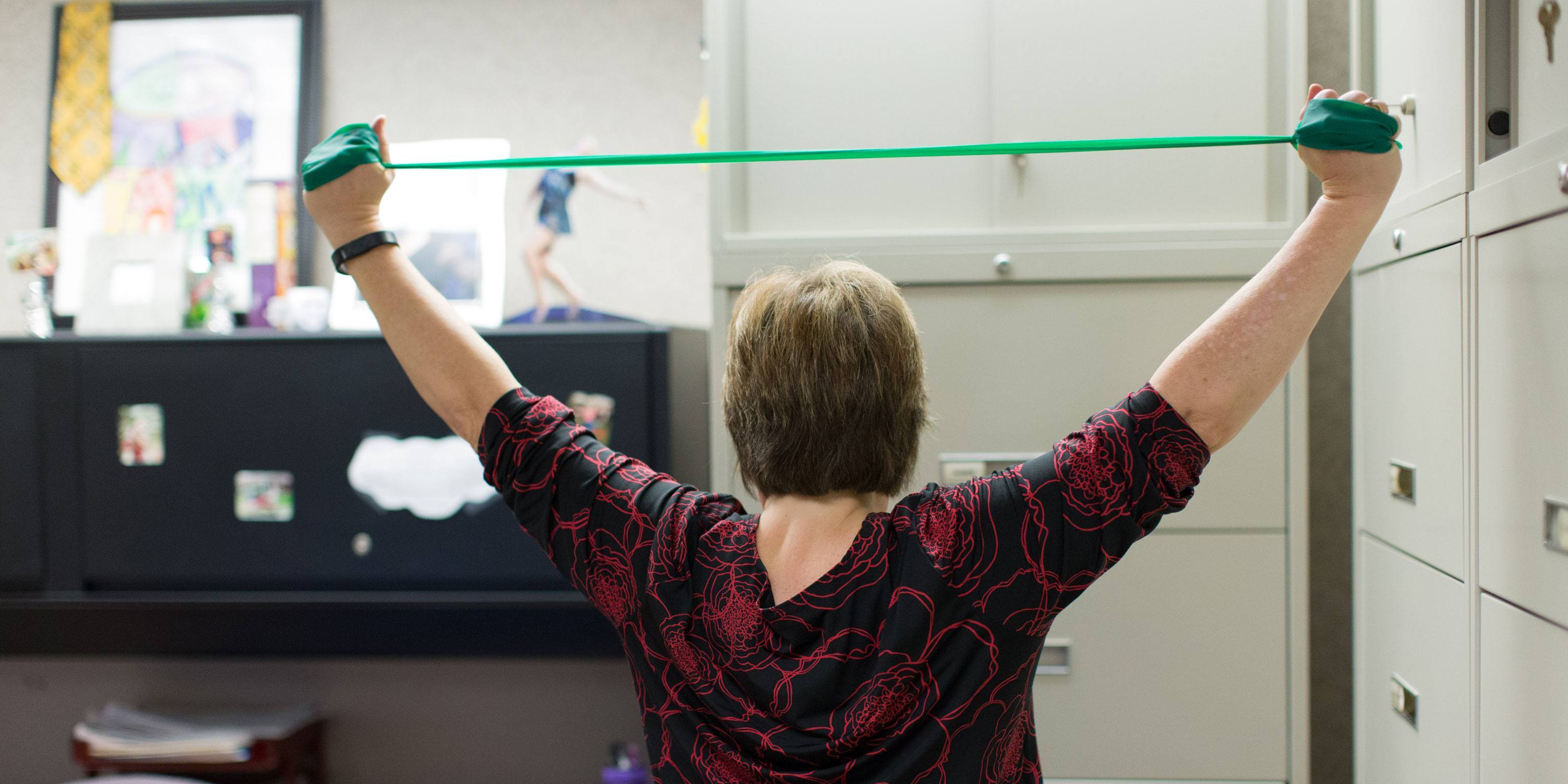 Woman exercising with a stretch band
