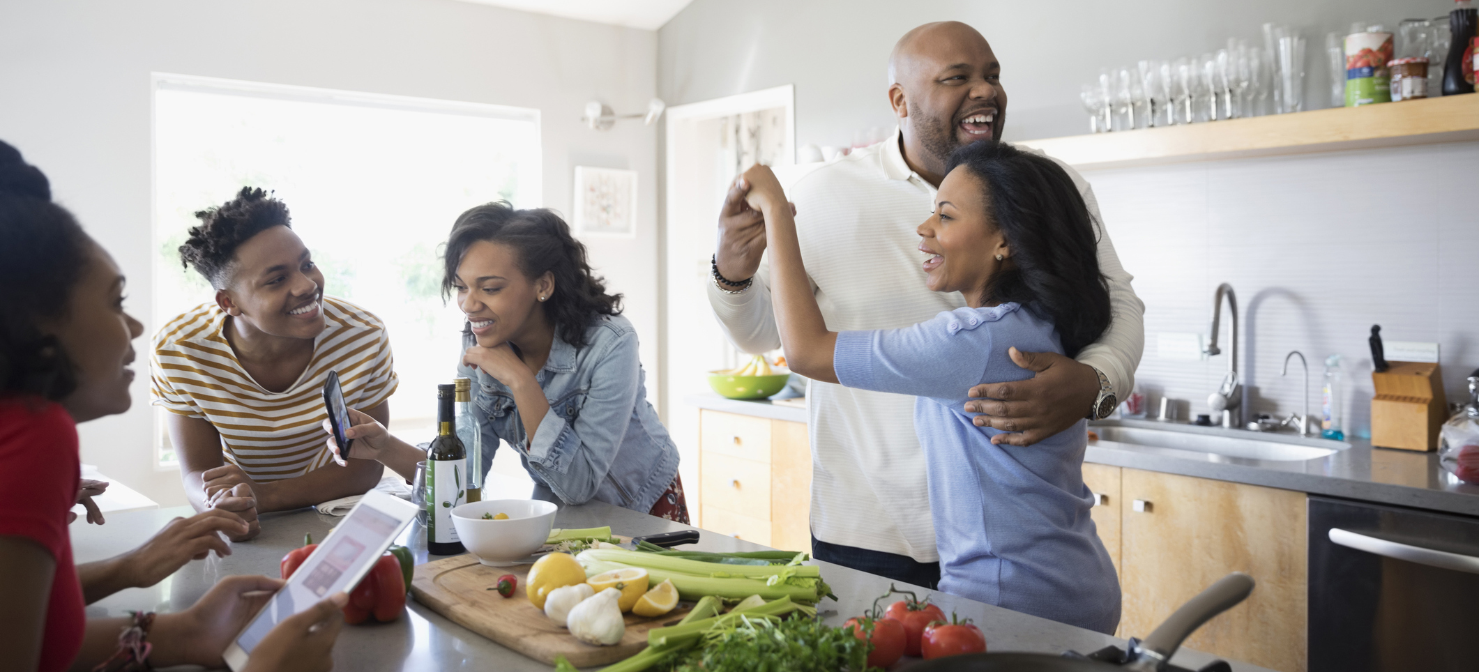 Family cooking together and having a good time